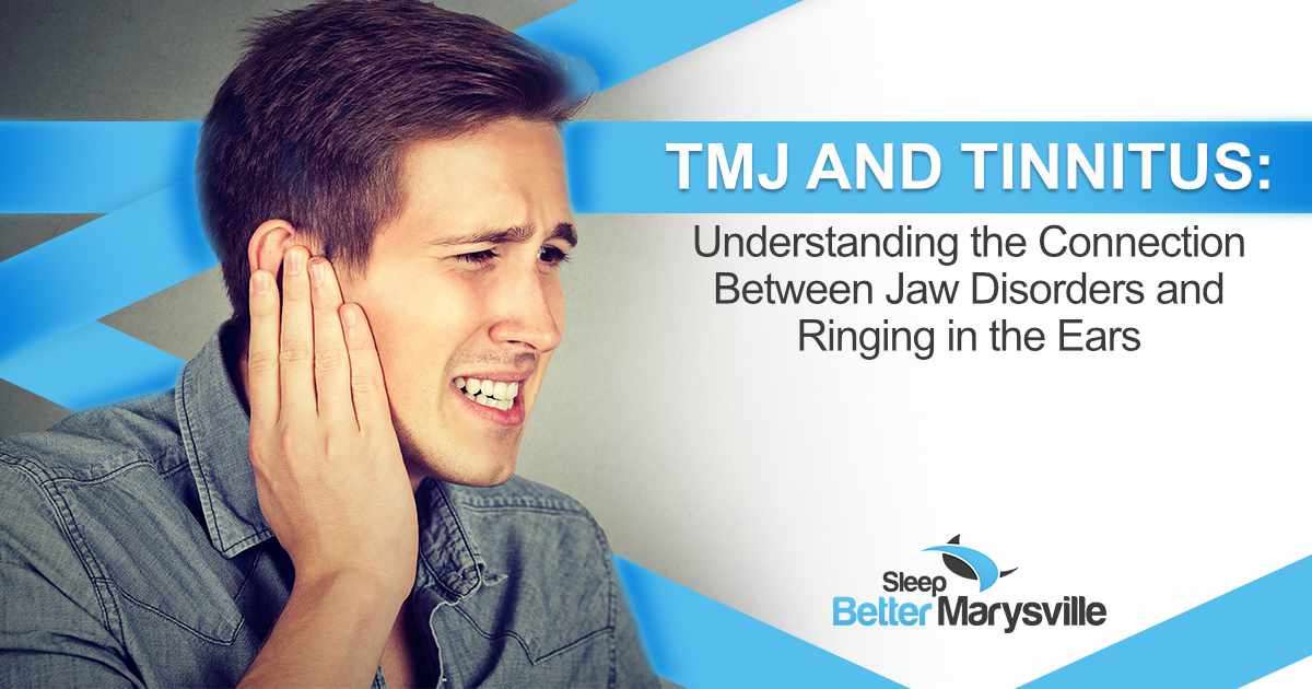 Man holding his ear while experiencing ringing that may be associated with TMJ disorder