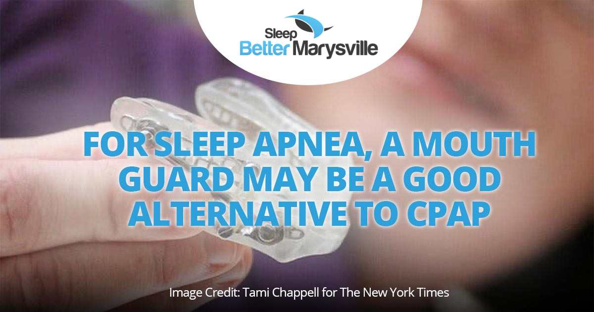 Person holding a sleep apnea mouth guard from NY Timesptima, featured in Sleep Better Marysville's article on mouth guards as an alternative to CPAP for sleep apnea.